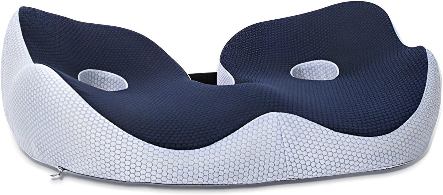 Angled top view of the navy blue seat cushion with a gray mesh base and ergonomic seating surface